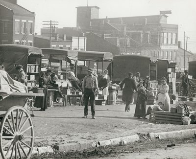 Horizontal, Black and White Photograph of Market Stalls and People Shopping by William G. Swekosky